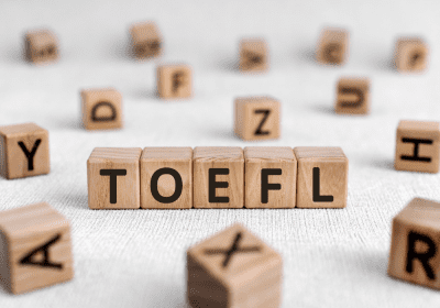 Letter blocks spelling out TOEFL